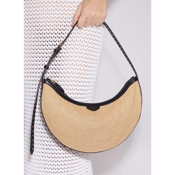 Alaïa Demi Lune Bag In Paper Straw at Enigma Boutique